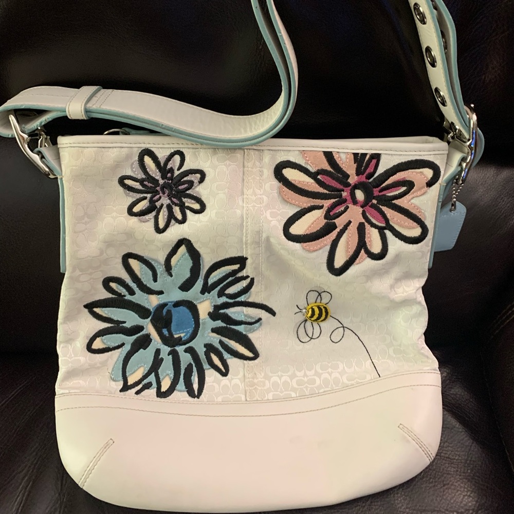 11”x11”x.75” Adjustable strap is 8.34” at longest
